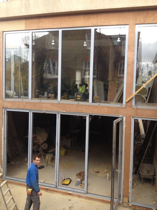 Aluminium bi-fold doors with two-storey glazing in Hemel Hempstead