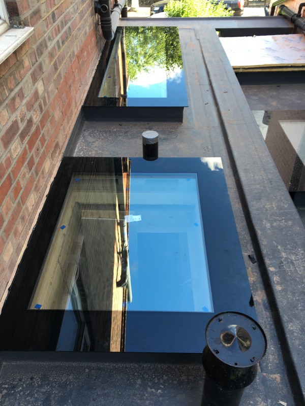 Multiple flat roof skylights on extension in Hemel Hempstead